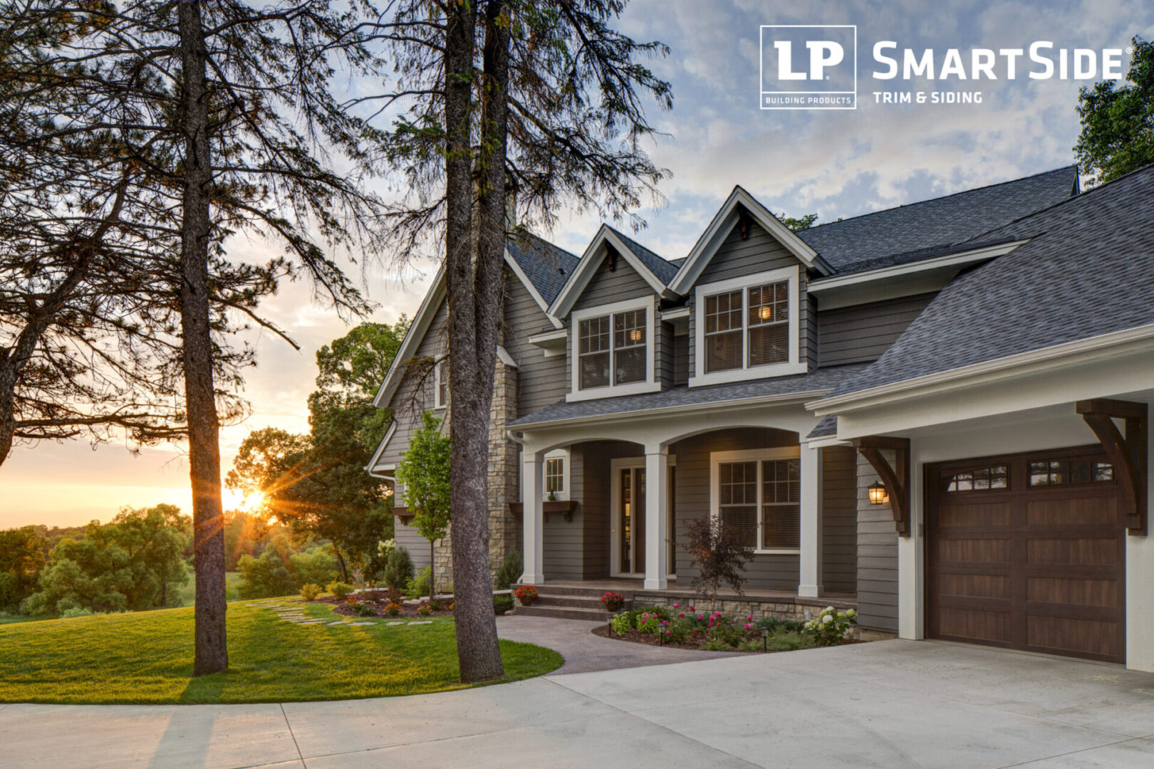 LP_Assets_HighRes High res - grey house with white trim, large fir trees, sunset - DOWNLOAD OR SHARE