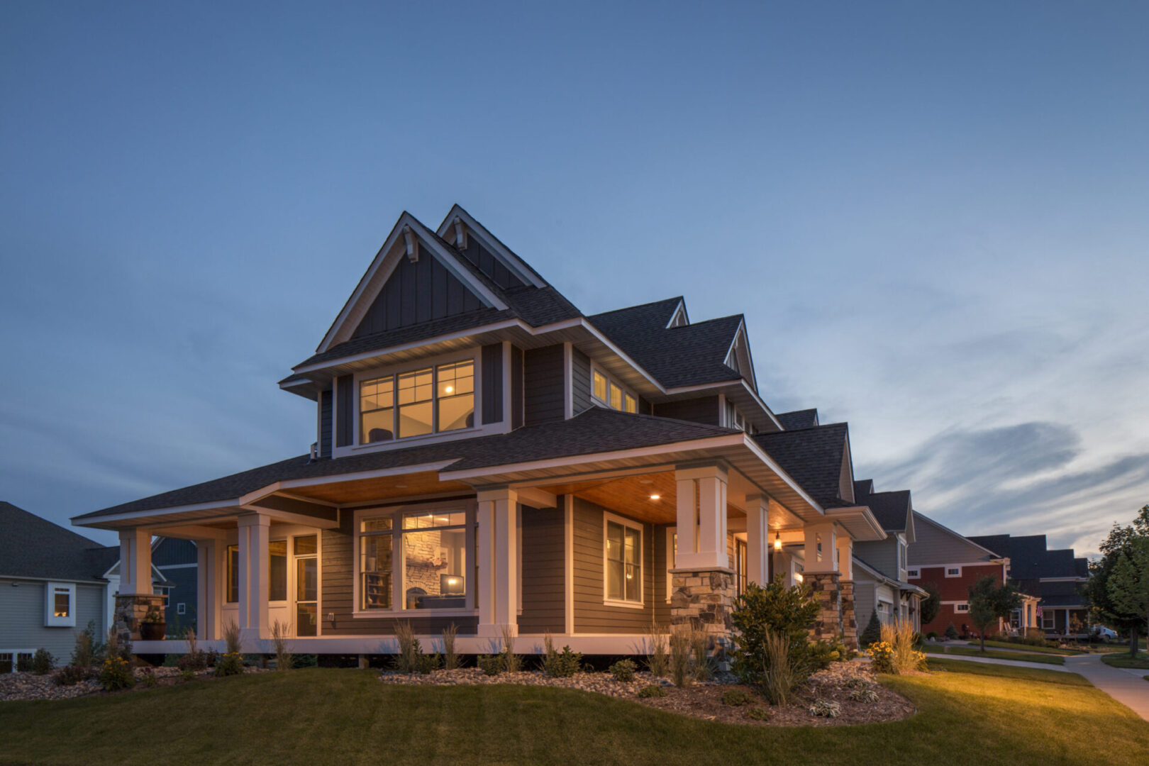 LP_Assets_HighRes High res - grey house with large porch, night view 2 - DOWNLOAD OR SHARE